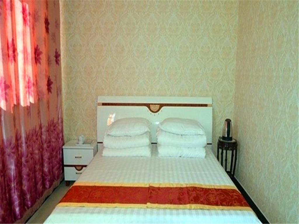 Pingyao Dichangjiu Inn Пинъяо Номер фото